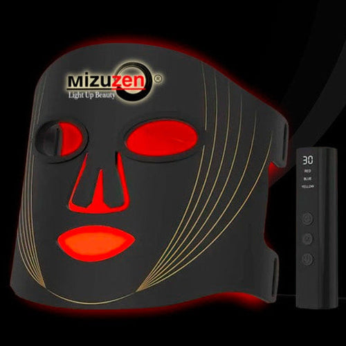 Mizuhan LED face mask with control device on a black background